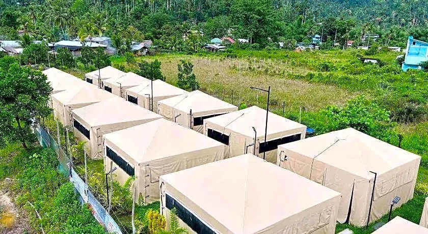 Travelers relaxing in the shared lounge area